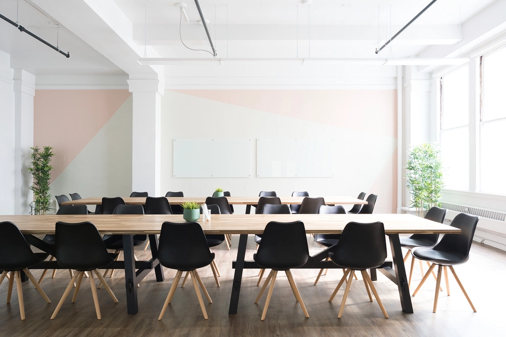 A coworking space with desks and chairs
