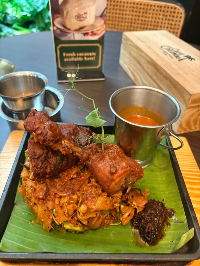 An Indian banana leaf meal with curries and rice in Malaysia