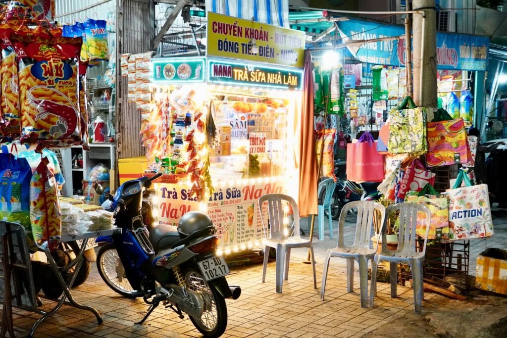 A colourful street vendor stall at a night market