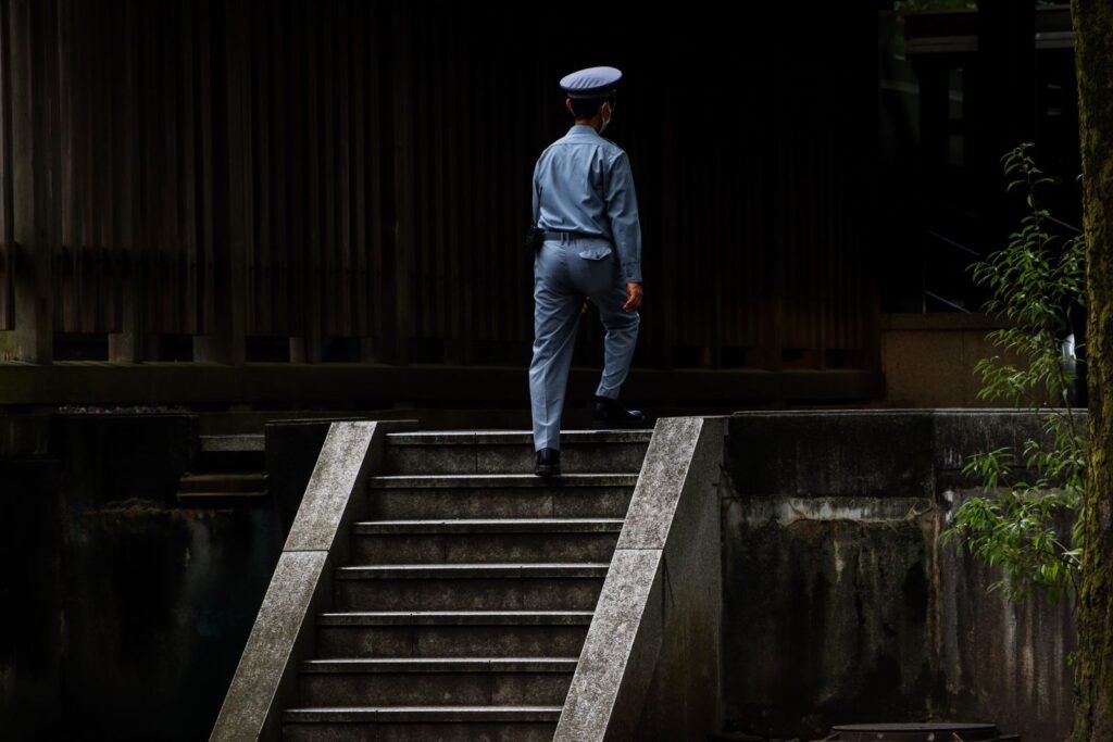 A security officer in uniform on duty