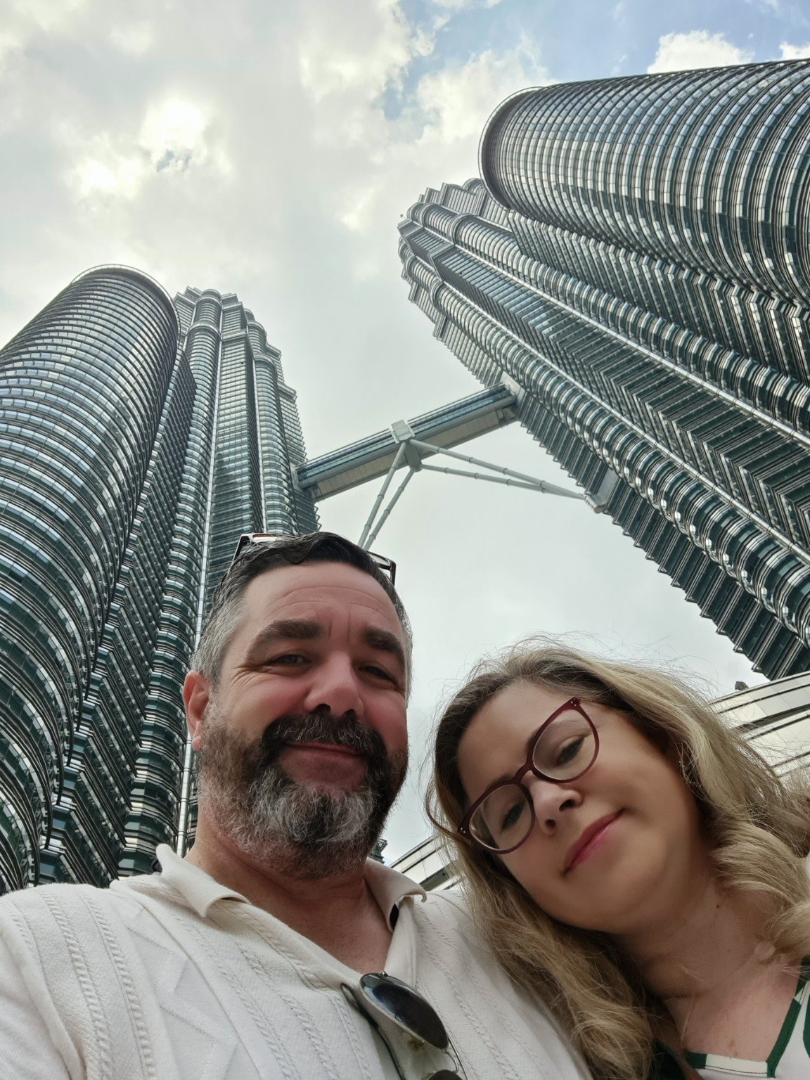 Edward and Jacqueline visiting the Petronas Twin Towers in Kuala Lumpur